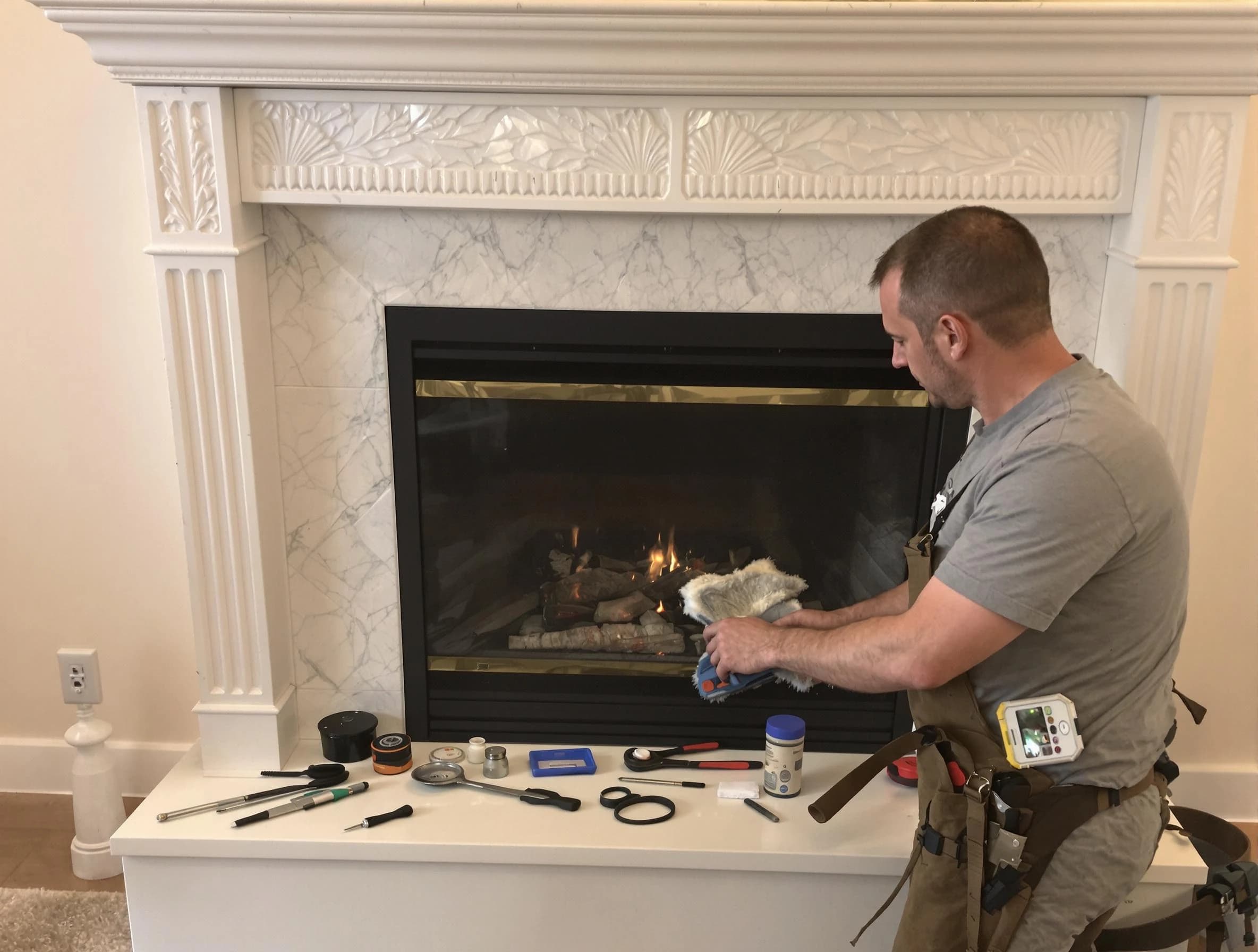 Washington Terrace Chimney Sweep performing fireplace maintenance in Washington Terrace, UT